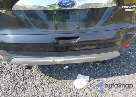 2016 Ford Escape Titanium z USA, uszkodzony, nr VIN 1FMCU9J90GUC16559